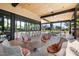 Inviting covered patio with comfortable seating and views of the lush grounds at 7700 E Gainey Ranch Rd # 127, Scottsdale, AZ 85258