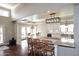 Kitchen island features granite countertops and bar seating with pendant lighting at 8717 E Spanish Barb Trl, Scottsdale, AZ 85258