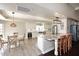 Bright kitchen features white cabinetry, stainless steel appliances, and a breakfast nook at 8717 E Spanish Barb Trl, Scottsdale, AZ 85258