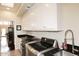 Bright laundry room features updated appliances, black countertop, and white cabinets at 8717 E Spanish Barb Trl, Scottsdale, AZ 85258