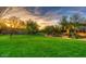 Lush backyard featuring green lawn and serene landscaping at 8965 E Mountain Spring Rd, Scottsdale, AZ 85255