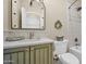 Traditional bathroom featuring a decorative mirror, and vintage vanity at 8965 E Mountain Spring Rd, Scottsdale, AZ 85255