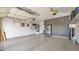 Spacious garage with epoxy flooring and custom storage cabinets at 8965 E Mountain Spring Rd, Scottsdale, AZ 85255