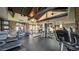 Well-equipped gym with treadmills and stone-accented walls, offering a rustic yet modern fitness experience at 8965 E Mountain Spring Rd, Scottsdale, AZ 85255
