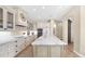 Gourmet kitchen with a large center island, custom cabinetry, and modern stainless steel appliances at 8965 E Mountain Spring Rd, Scottsdale, AZ 85255