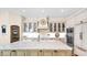 Bright kitchen with a large center island with granite countertops and modern stainless steel appliances at 8965 E Mountain Spring Rd, Scottsdale, AZ 85255