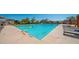 Community pool with lap lanes, lounge chairs, umbrellas, and plenty of space for relaxing and recreation at 8965 E Mountain Spring Rd, Scottsdale, AZ 85255