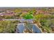 Aerial view of a neighborhood featuring lush landscaping and mature trees at 8965 E Mountain Spring Rd, Scottsdale, AZ 85255