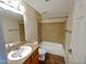 The bathroom has updated fixtures, granite countertops, and tile shower and flooring at 985 N Granite Reef Rd # 134, Scottsdale, AZ 85257