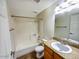 Clean bathroom featuring a shower-tub combo and a granite vanity with an oval sink at 985 N Granite Reef Rd # 134, Scottsdale, AZ 85257