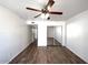 Spacious bedroom with wood-look flooring and a sliding closet door with mirrors at 985 N Granite Reef Rd # 134, Scottsdale, AZ 85257