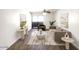Cozy living room with a ceiling fan, modern furniture, art and access to a balcony at 985 N Granite Reef Rd # 134, Scottsdale, AZ 85257