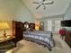 Bedroom features a ceiling fan and double doors leading to outside at 10224 E Minnesota Ave, Sun Lakes, AZ 85248