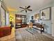 Office with wooden desk and bookcase at 10224 E Minnesota Ave, Sun Lakes, AZ 85248