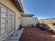 Enclosed patio features brick flooring, privacy walls and shade at 10224 E Minnesota Ave, Sun Lakes, AZ 85248