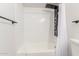 Bathroom shower with white subway tile and a black shower system is a great feature at 10750 W Abbott Ave, Sun City, AZ 85351