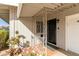 Charming front porch with decorative railing and a welcoming entrance at 10750 W Abbott Ave, Sun City, AZ 85351