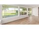 Well-lit sunroom with an outdoor view and easy access to the patio at 10750 W Abbott Ave, Sun City, AZ 85351