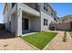 Backyard features a patio, landscaping, and privacy fence at 1123 E Mcneil St, Phoenix, AZ 85042