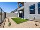 Backyard features a patio, landscaping, and privacy fence at 1123 E Mcneil St, Phoenix, AZ 85042