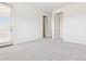 Well-lit, neutral carpet bedroom provides lots of natural light, and multiple entries at 1123 E Mcneil St, Phoenix, AZ 85042