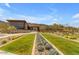 Picturesque clubhouse surrounded by lush landscaping and beautiful mountain views at 1123 E Mcneil St, Phoenix, AZ 85042
