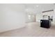 Modern kitchen featuring white cabinets and a dark island with stainless steel appliances, perfect for entertaining at 1123 E Mcneil St, Phoenix, AZ 85042