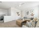 Comfortable loft featuring a cozy sectional, playful decorations, and ample natural light at 1123 E Mcneil St, Phoenix, AZ 85042