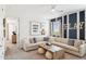 Cozy loft area with a sectional sofa, fun decor, and a ceiling fan for added comfort at 1123 E Mcneil St, Phoenix, AZ 85042
