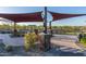 The Park View features covered seating and landscaped area in a serene setting at 1123 E Mcneil St, Phoenix, AZ 85042