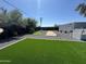 Backyard with a bocce ball court, putting green, and updated landscape at 12209 N 66Th St, Scottsdale, AZ 85254