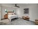 Cozy bedroom features a comfortable bed, stylish decor, and ample natural light from the windows at 12209 N 66Th St, Scottsdale, AZ 85254