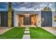 Beautiful front entrance featuring a modern doorway and desert landscaping at 12209 N 66Th St, Scottsdale, AZ 85254