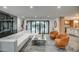 Modern living space with an open floor plan flowing into an outdoor entertaining area at 12209 N 66Th St, Scottsdale, AZ 85254