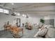 Bright living room featuring vaulted ceilings, exposed beams, and stylish decor at 12209 N 66Th St, Scottsdale, AZ 85254