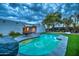 Lush backyard featuring a pool, elegant patio, and manicured landscaping at 12209 N 66Th St, Scottsdale, AZ 85254