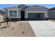 Charming single-story home featuring a low maintenance desert-scape front yard and attached two car garage at 1331 S Vista Ave, Florence, AZ 85132