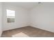 Bright bedroom with one window and neutral carpet at 13653 W Crabapple Dr, Peoria, AZ 85383