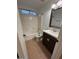 This bathroom features a shower-tub combo with a vanity at 15659 W Ripple Cir, Goodyear, AZ 85338