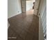 Bedroom featuring tile floors and natural light at 15659 W Ripple Cir, Goodyear, AZ 85338
