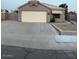 Charming single-story home with a two-car garage and a low maintenance yard at 15659 W Ripple Cir, Goodyear, AZ 85338