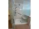 Modern shower with a glass door, a shower head, and a built-in bench at 15659 W Ripple Cir, Goodyear, AZ 85338