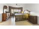 Warm bedroom featuring stylish furnishings, neutral paint, ceiling fan, and natural light from a window at 15848 W Lahlum Ln, Surprise, AZ 85374