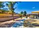 Backyard featuring a park and a covered playground, perfect for outdoor fun at 16026 N 171St Ln, Surprise, AZ 85388