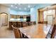 Open concept dining area showcasing kitchen with center island and stainless appliances at 16026 N 171St Ln, Surprise, AZ 85388