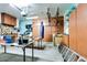 Functional garage with ample storage cabinets, workbench, and overhead lighting at 16026 N 171St Ln, Surprise, AZ 85388