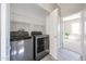 Convenient laundry room with washer and dryer connections, close to bedroom at 16137 W Quail Creek Ln, Surprise, AZ 85374