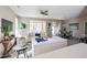 Inviting living room features an open layout with a dining area, comfortable seating, and abundant natural light at 16137 W Quail Creek Ln, Surprise, AZ 85374