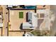 Aerial view showcasing the property's layout and its expansive backyard with dirt landscaping at 1642 E Turney Ave, Phoenix, AZ 85016