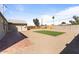A spacious backyard with pavers and gravel at 1642 E Turney Ave, Phoenix, AZ 85016